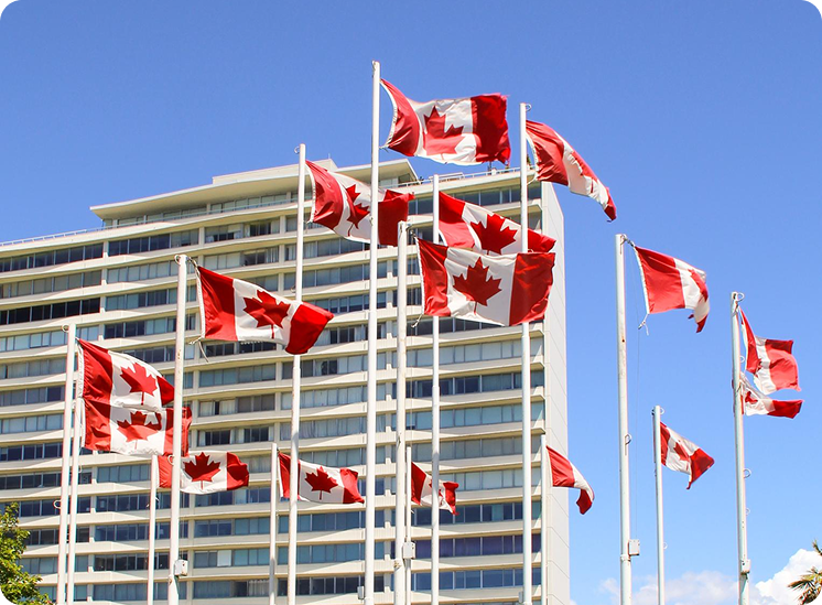 Canadian flags outside modern school
